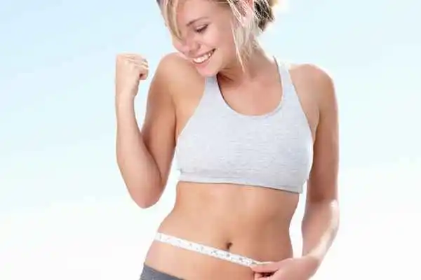 woman happy after fat reduction treatment Norfolk