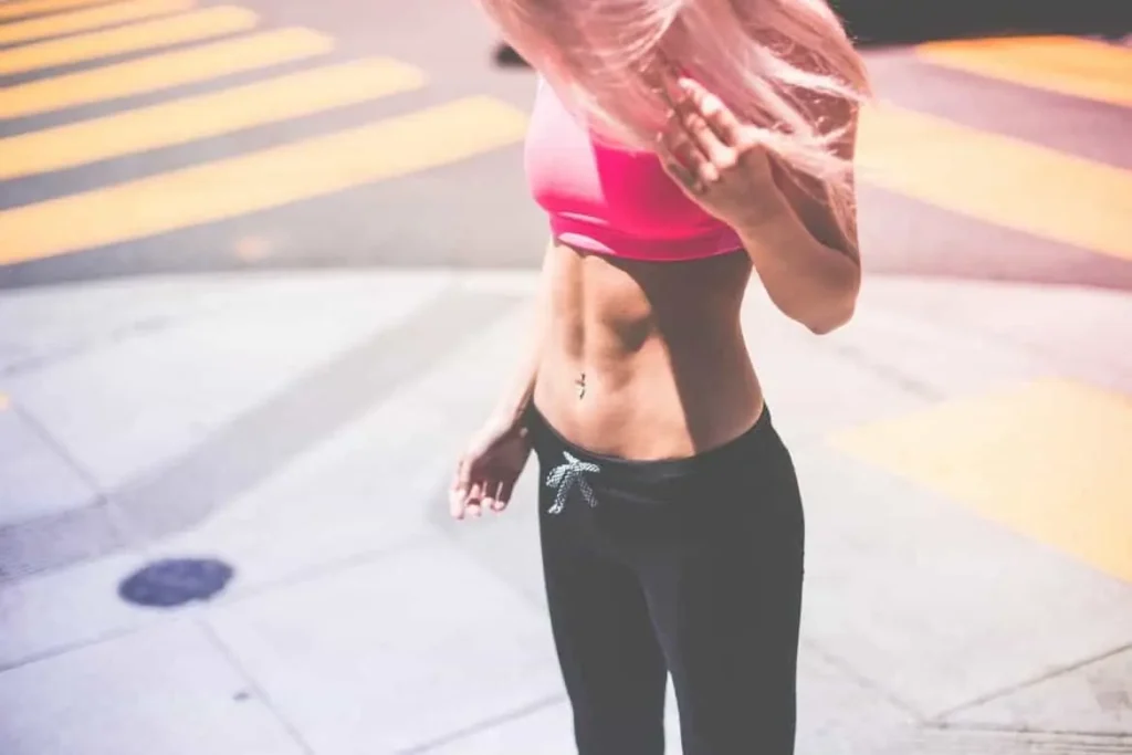 Woman with toned stomach after LA-EMS Body Sculpting Treatment Norfolk