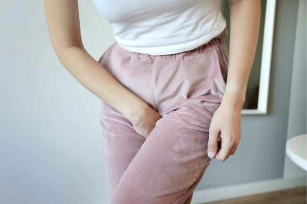 woman running for the toilet because of urinary incontinence Norfolk
